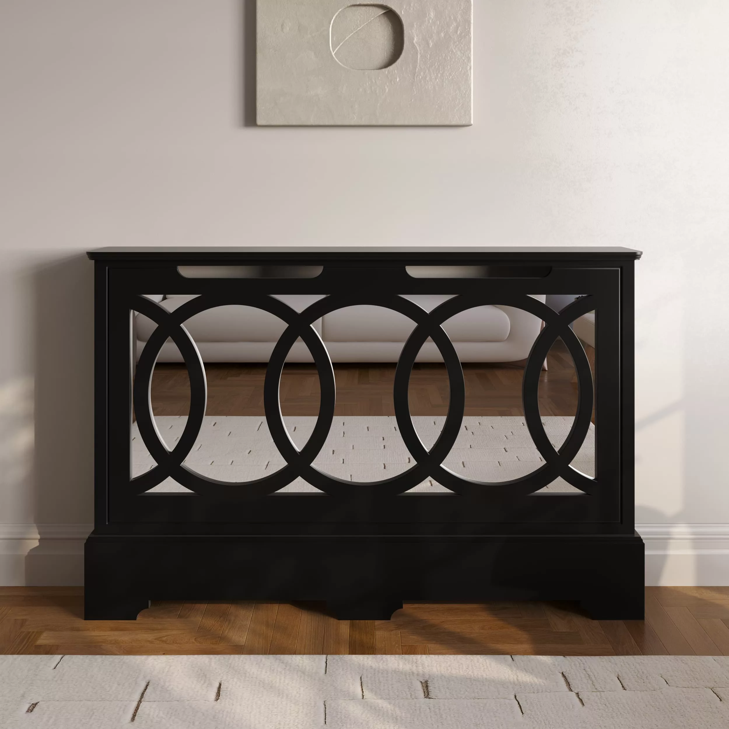 -https://radiatorcabinetsuk.co.uk/wp-content/uploads/2026/01/radiator-cabinet_mirrored_standing_interlocking-rings_Black-RAL-9005_standard-top.webp