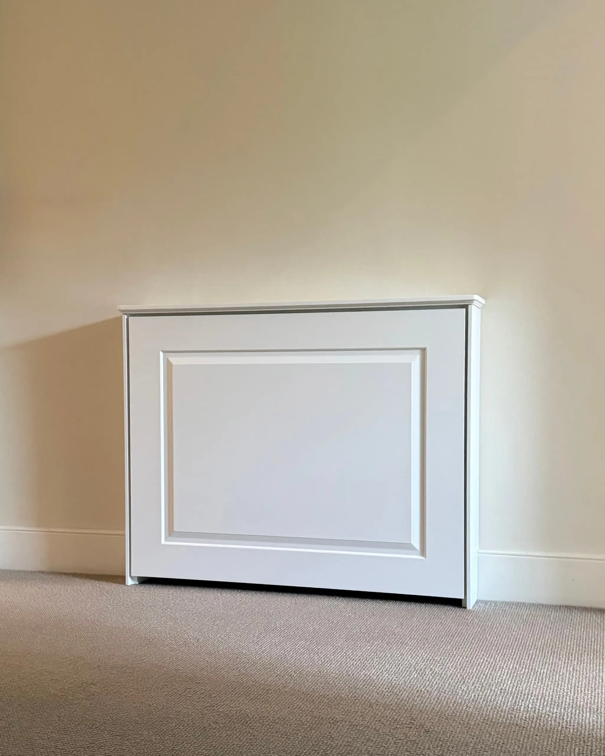-https://radiatorcabinetsuk.co.uk/wp-content/uploads/2026/06/Bevel-Panel_Traditional_-Radiator-Cabinet_in_Soft-White-scaled.webp