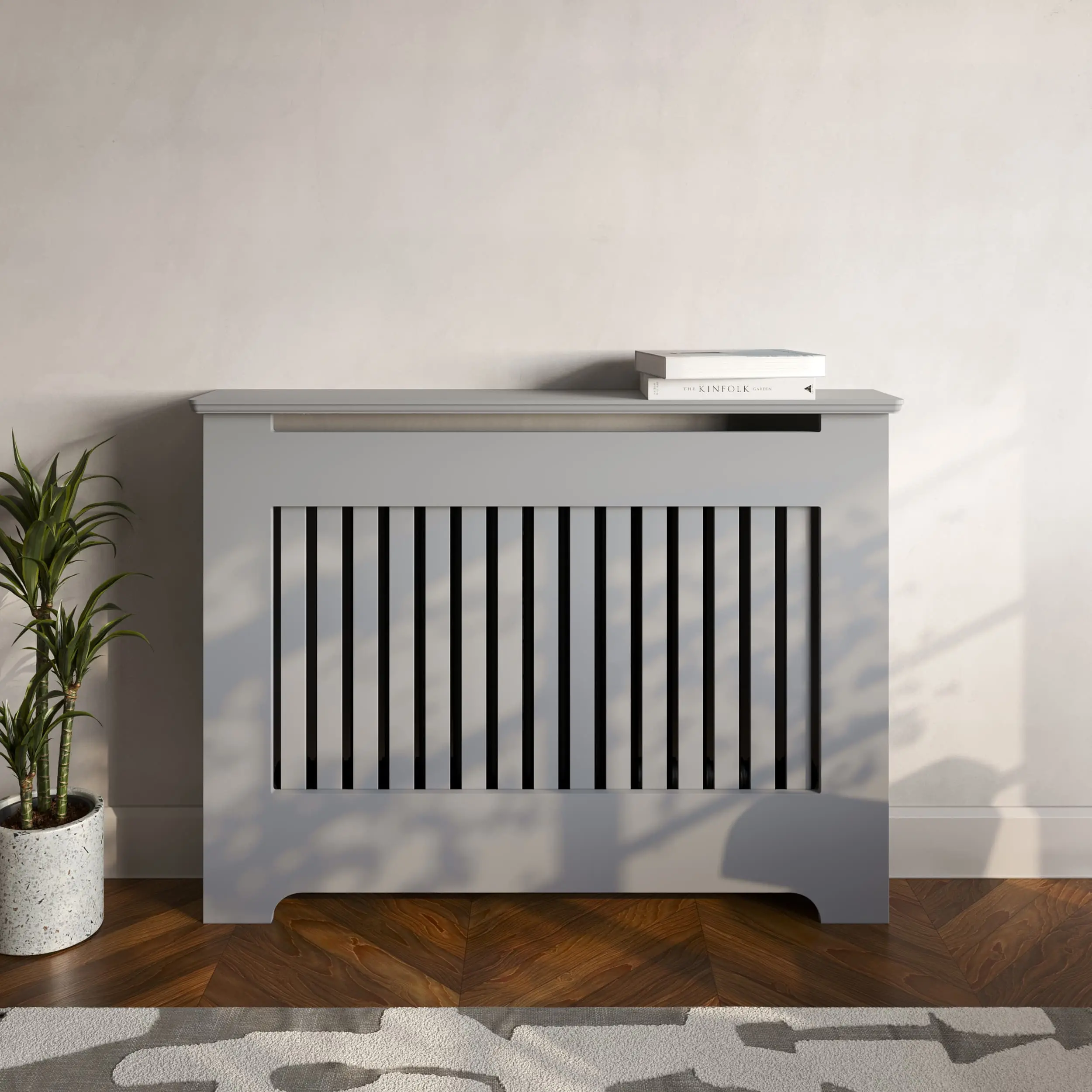 -https://radiatorcabinetsuk.co.uk/wp-content/uploads/2026/07/radiator-cabinet_traditional_vertical-slats_standing_essential_mid-grey_standard-top.webp